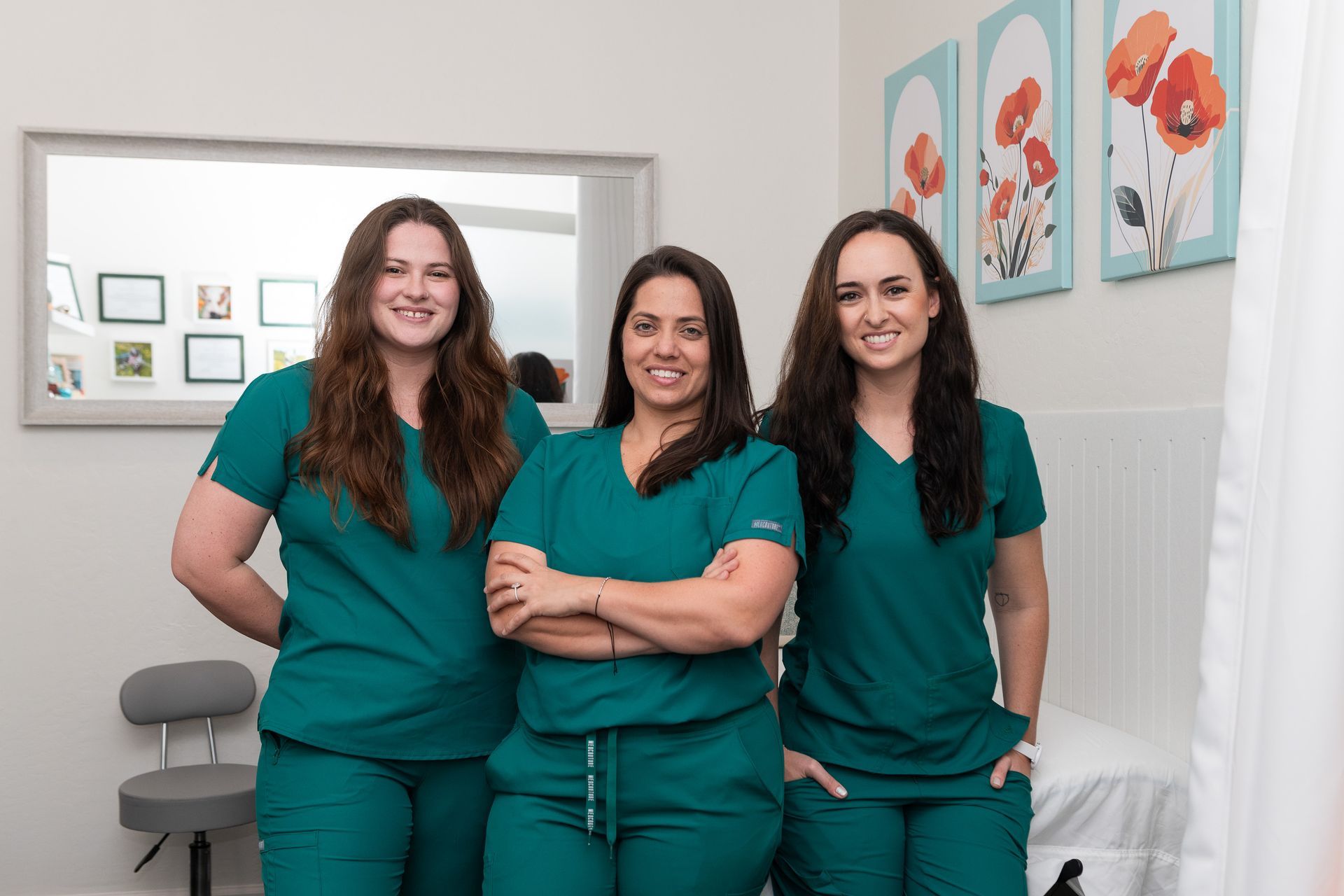 Bailey, Carie, and Spencer — the Love Your Health naturopathic team in their Tempe clinic